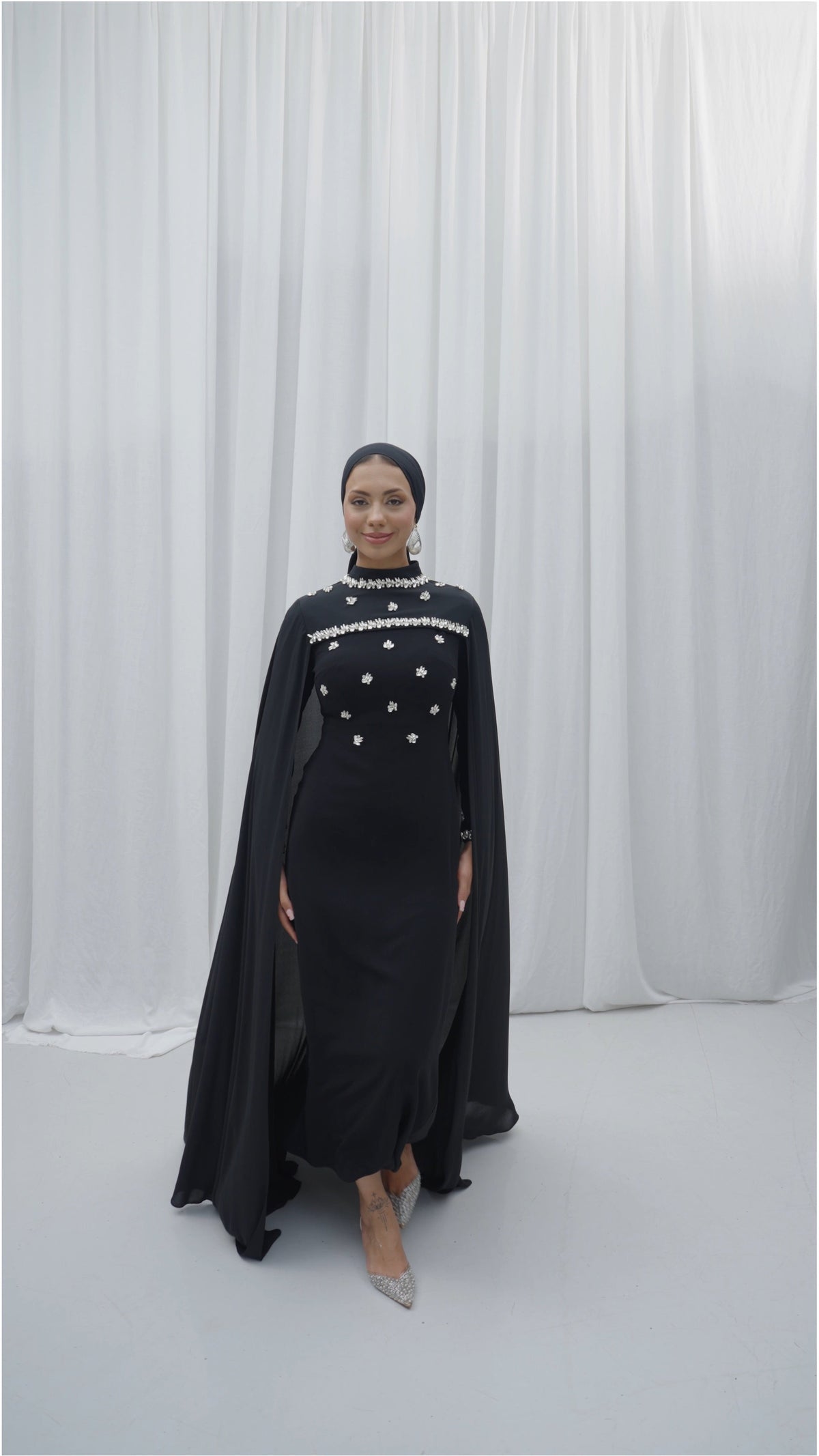 CAPED EVENING DRESS