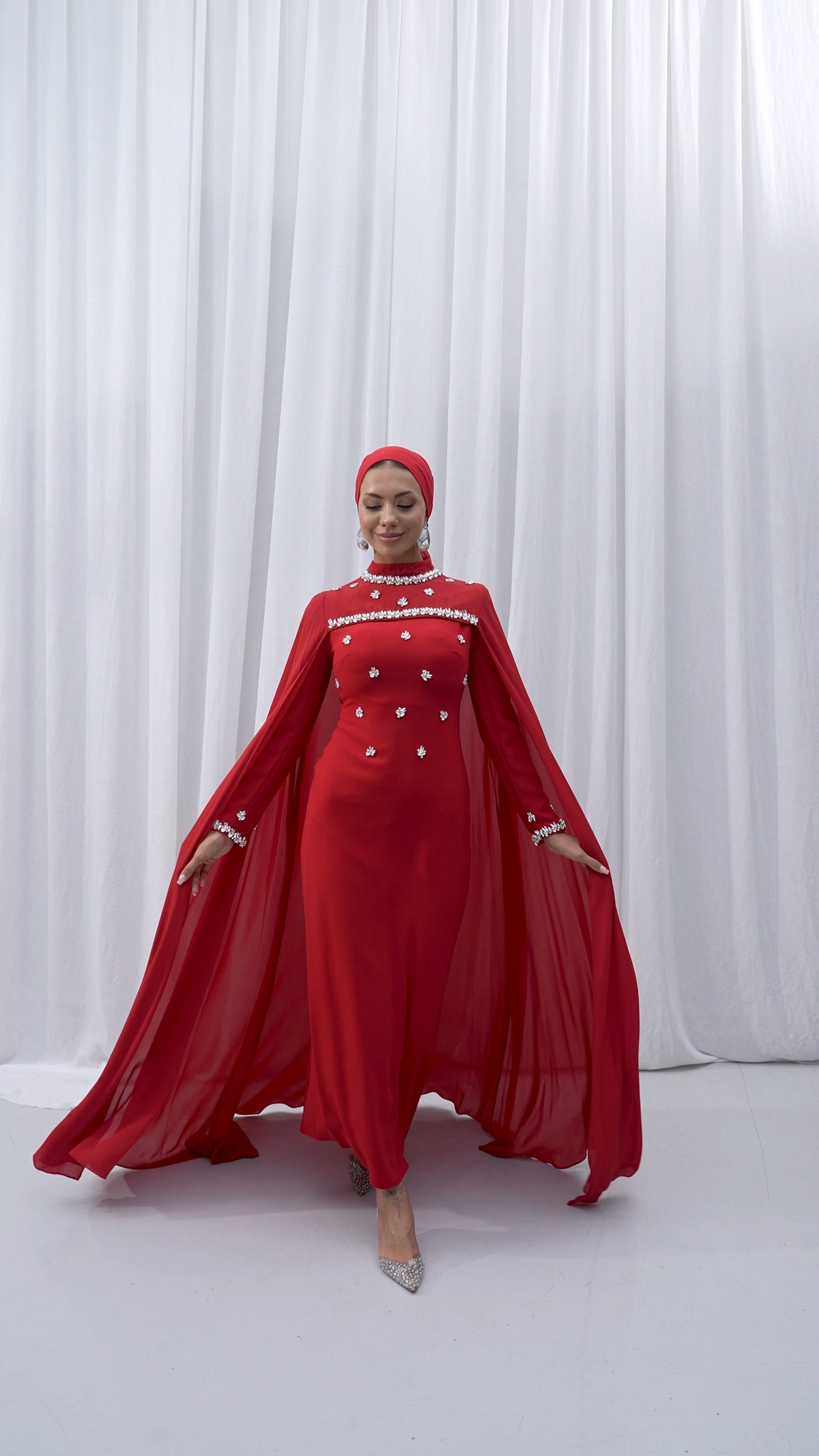 CAPED EVENING DRESS