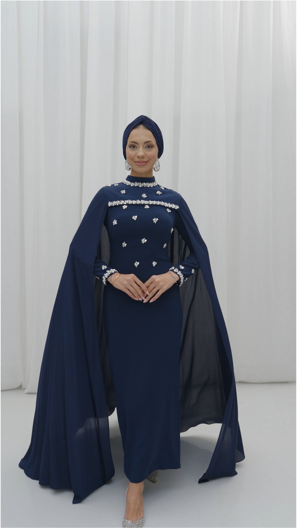 CAPED EVENING DRESS