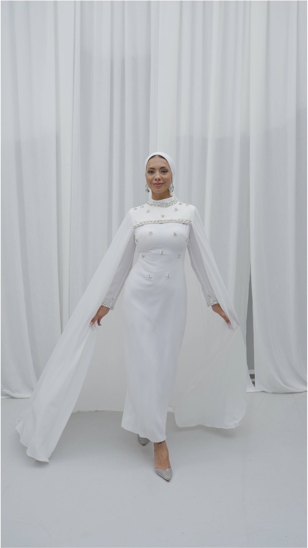 CAPED EVENING DRESS